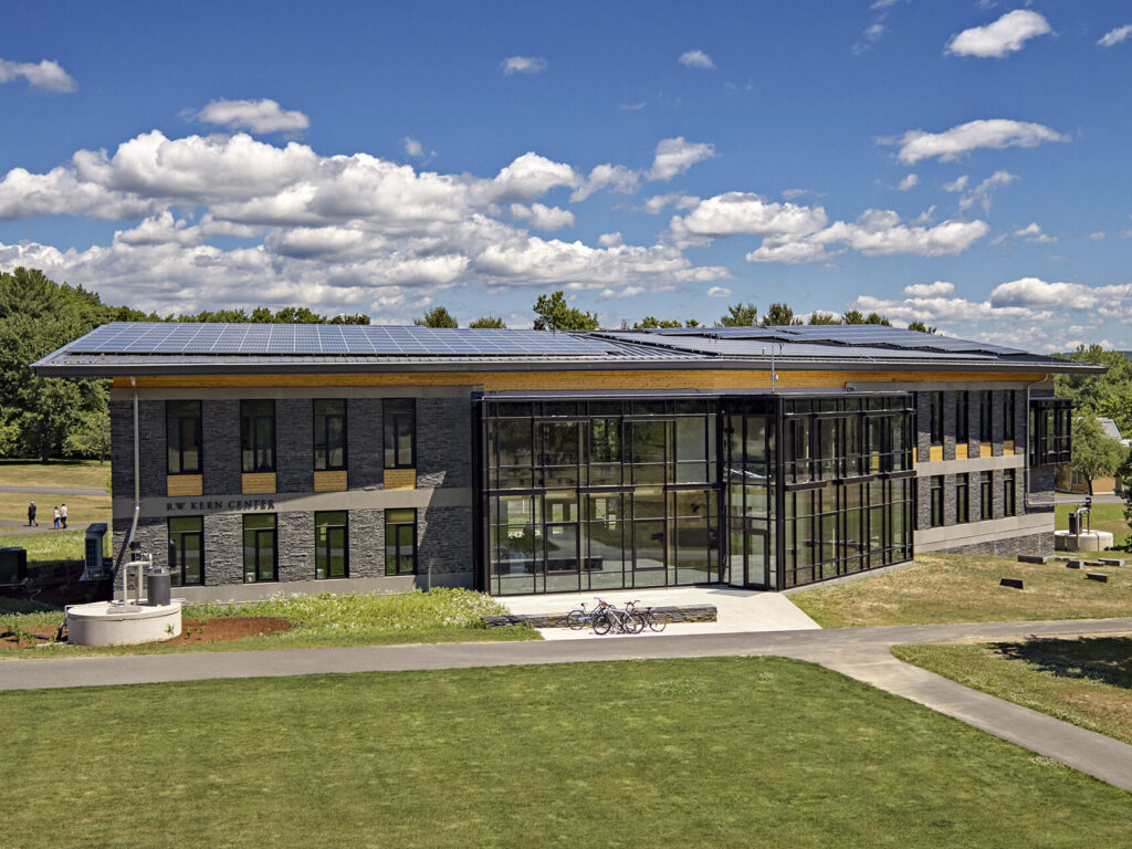 Robert bensonkerncenter37 | trim tab R W Kern center a modern brick and glass building with a solar panel roof on a sunny day