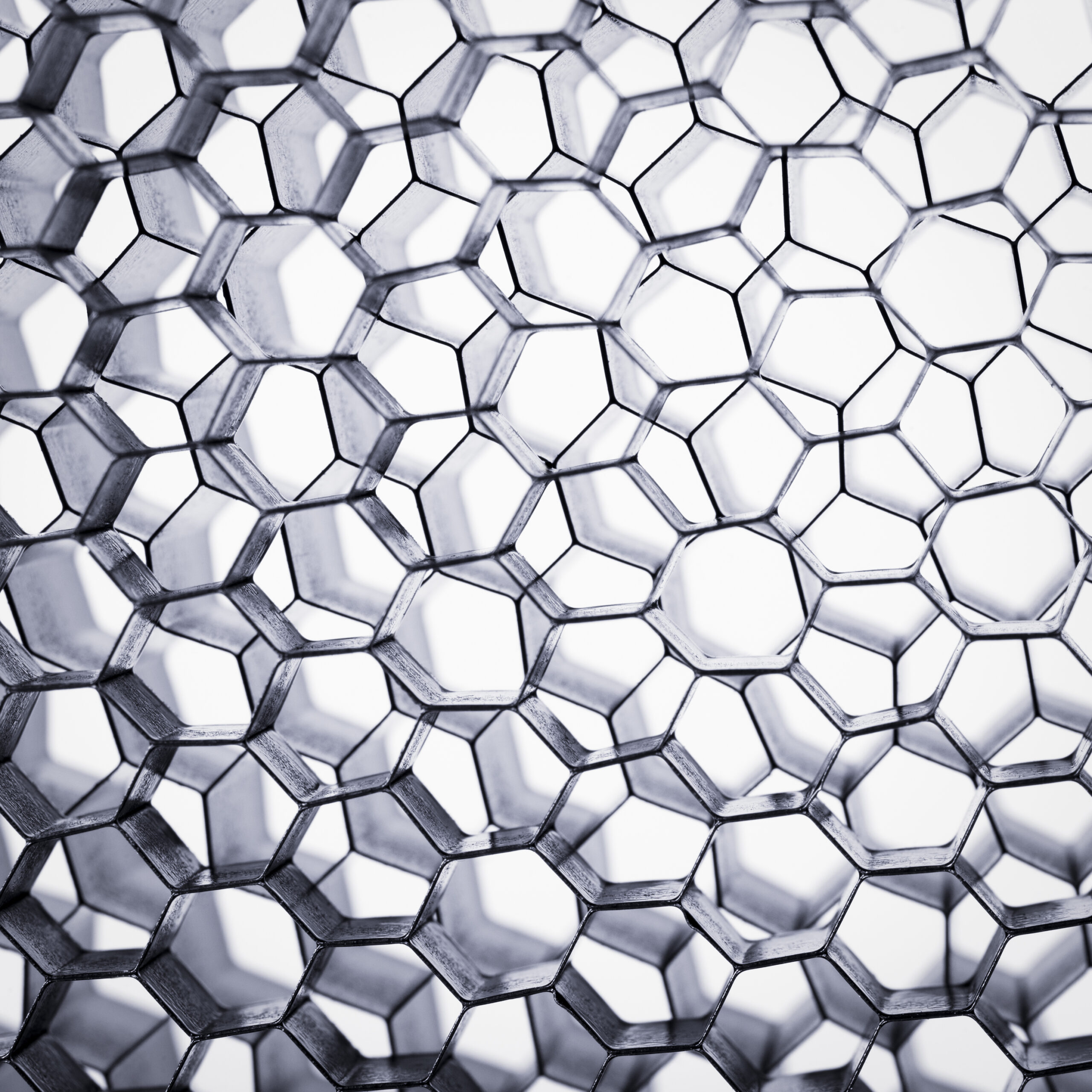 Istock000011202707large | trim tab Close up of a metal hexagonal lattice forming a mesh pattern silver and black edges